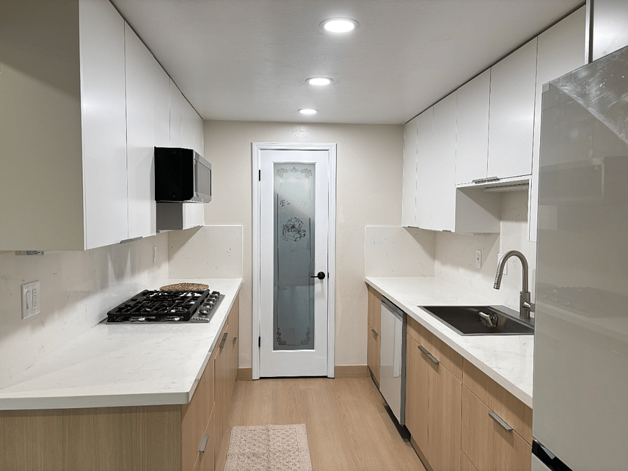 lots of storage spaces for kitchen cookware and utensils, food pantry