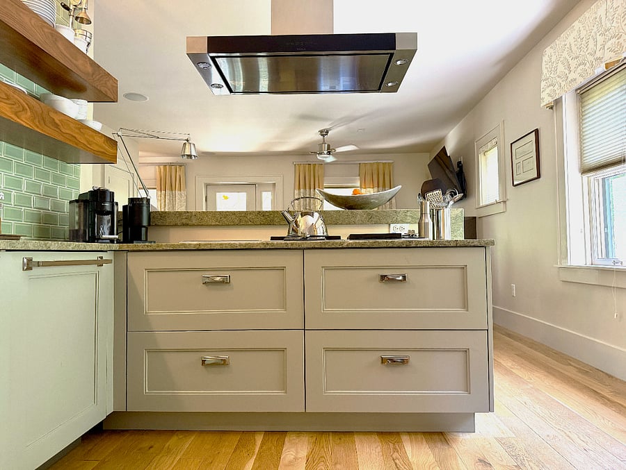 Kitchen with Wolf induction and Gas cooktop.