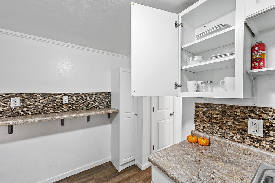 Eat in counter in the kitchen will have 2 barstools also and has a stand up pantry for extra storage.