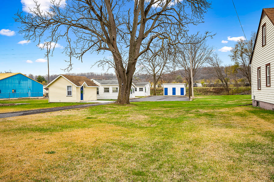 Total view of property with 3 separate mini homes on the property. Plenty of green space for dogs and sitting outside.