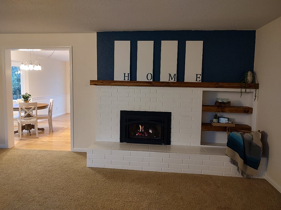 Spacious living room with cozy fireplace