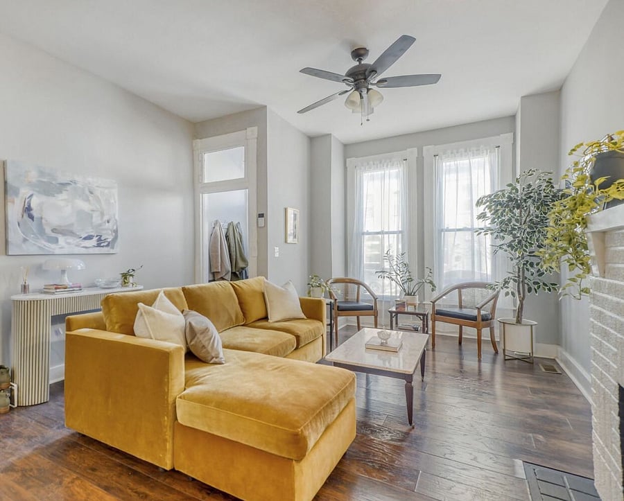 Shared living room with two friendly, professional women in late 30s