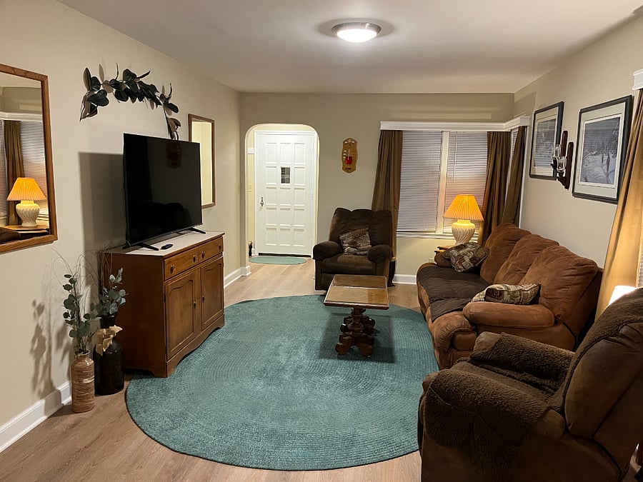 Living room with seating enough for company.