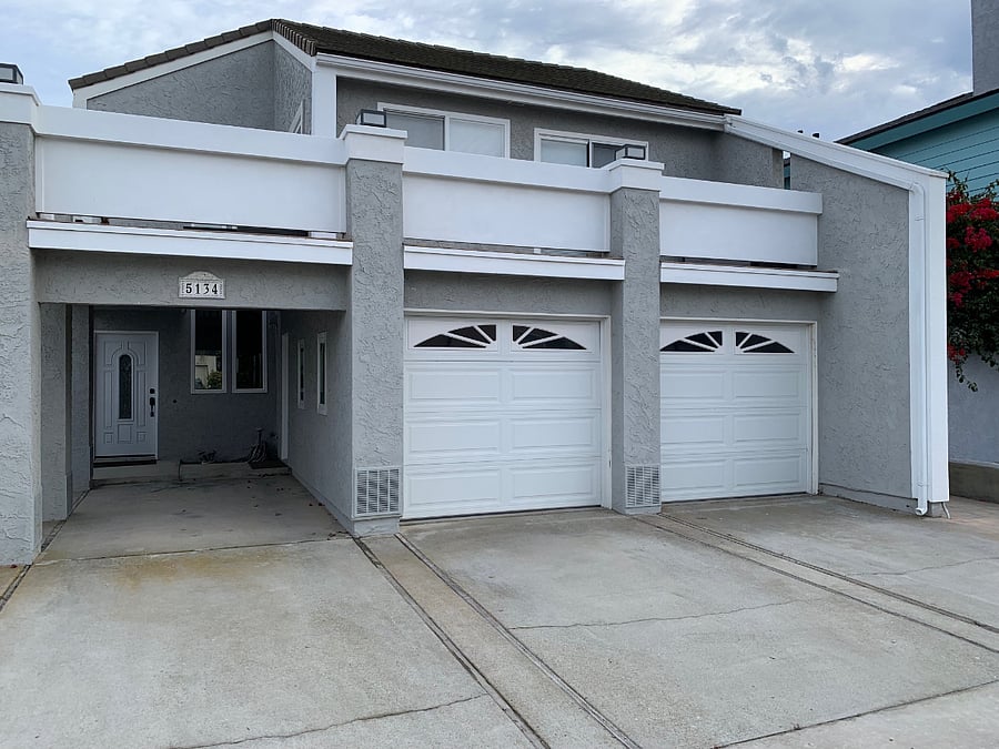 Two story duplex (1st floor for rent), two designated parking places (garage and driveway on the right side of the house).