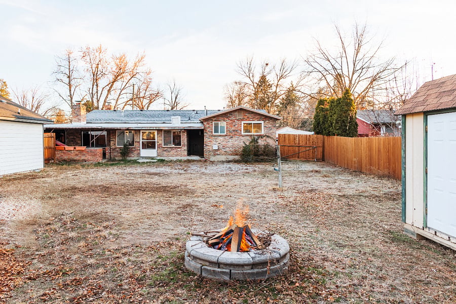 Large backyard with fire pit. We will include patio furniture in the spring. There is a large shed for storage.
