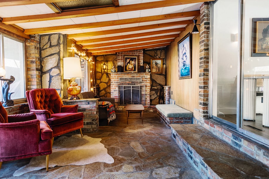 Three-season back room is great for hosting and connects to the backyard.