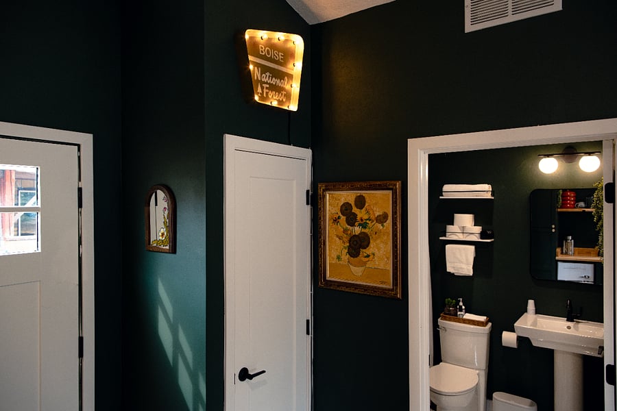 This closet has a water heater in it, but it does have some shelving on top that can be used for storing small items.