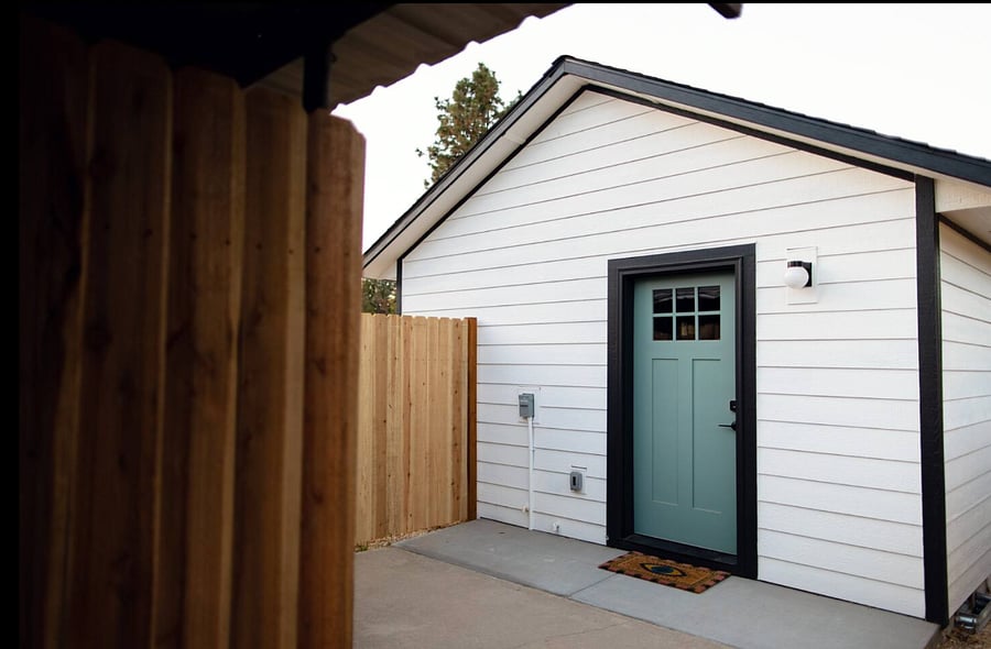 The front door of the studio. It is fenced off from the main house.