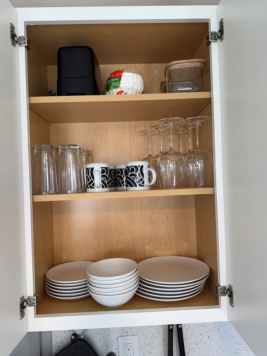 Fully Stocked Kitchenette with dishes, glassware, Pots and Pans and Silverware and Spices