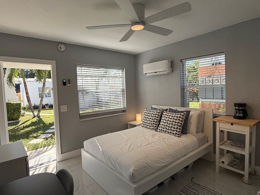 Comfy Queensize Bed with Storage Underneath, Split A/C and Ceiling Fan.