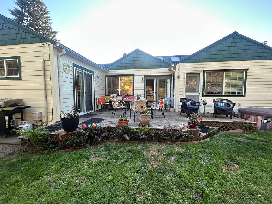 Shared back deck & sliding door to unit on left.
