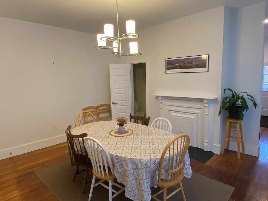 Spacious dining room with large table and plenty of seating. Open layout so your group can enjoy time together but still have your space. 