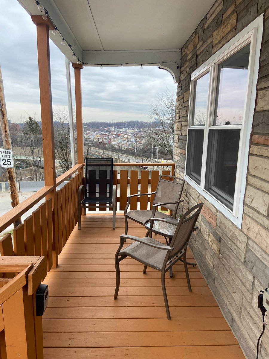 Relax on the front porch for gorgeous sunsets over the North Side / Troy Hill!