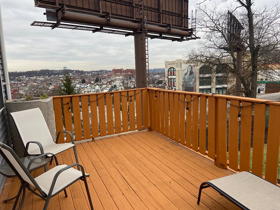 Relax on the 2nd floor back deck! Complete with a view over Bloomfield (can you spot West Penn Hospital?) and comfortable seating.