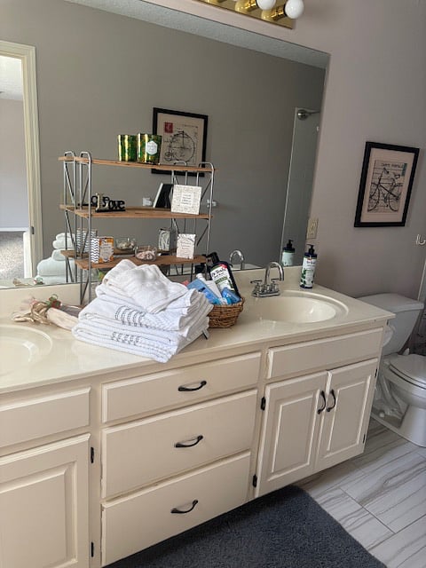 Rental bathroom is private with two sinks and lots of counter & storage space. A basket of necessities will be there for you. Hairdryer is available as well. 
