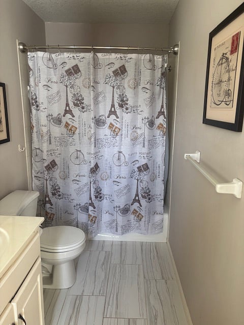 Private bathroom has tub shower combo. 