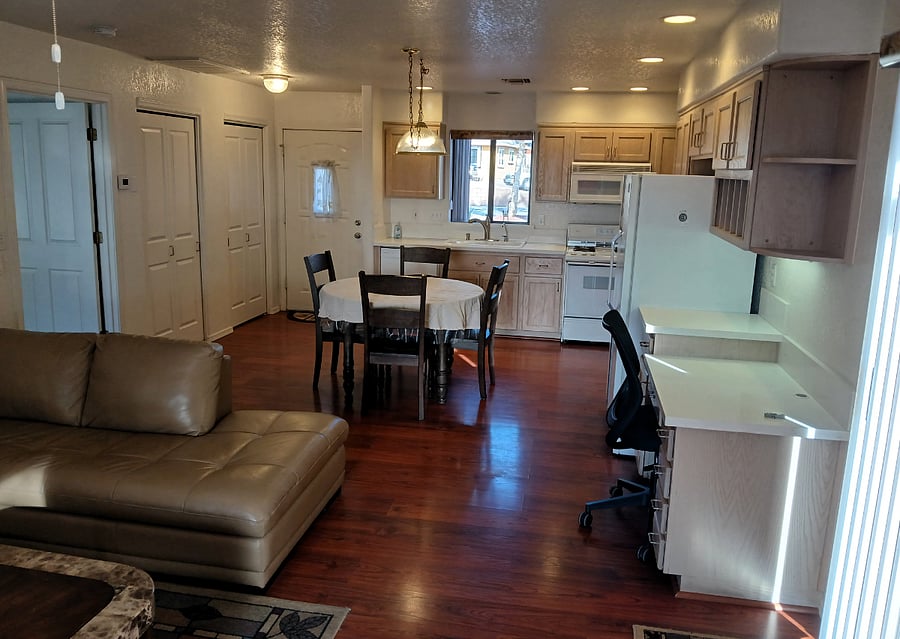 Another view from living area to show the kitchen. Bifold doors on left are pantry and coat closet.