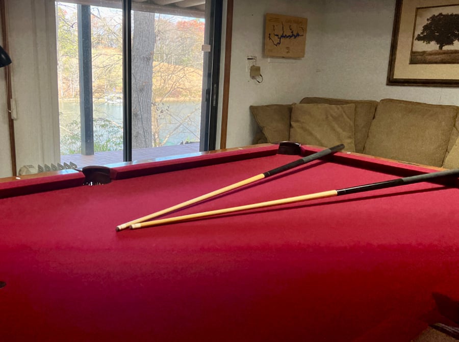 Wind down playing on this full size pool table overlooking the lake and your private patio.