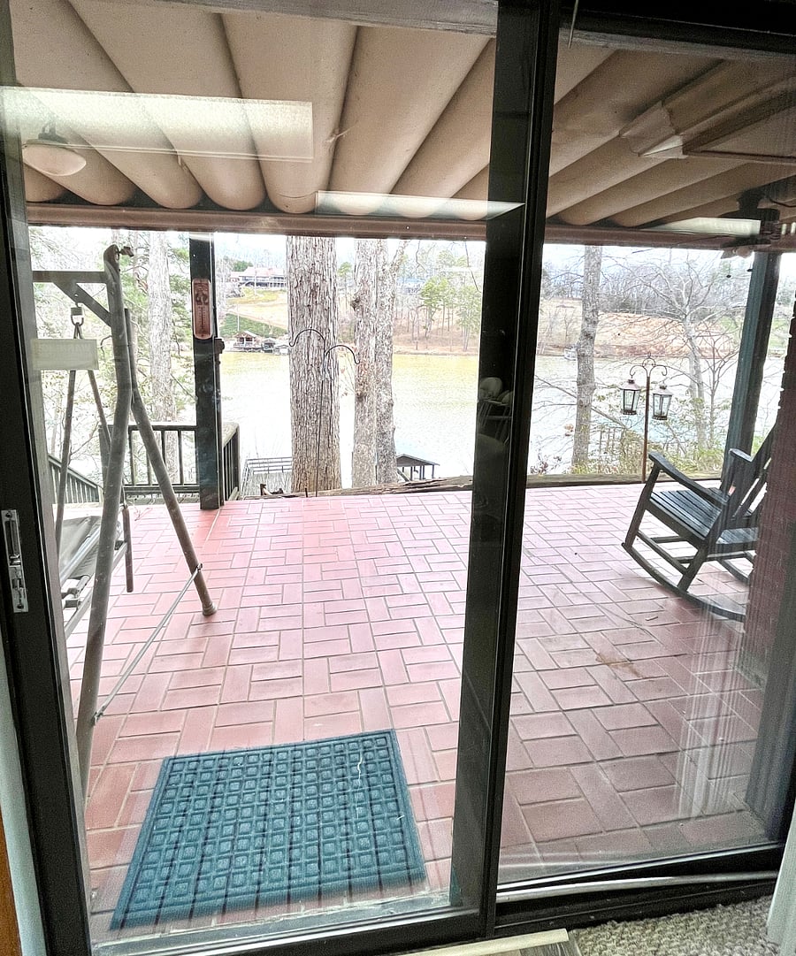Private covered deck with lake views and access. 
