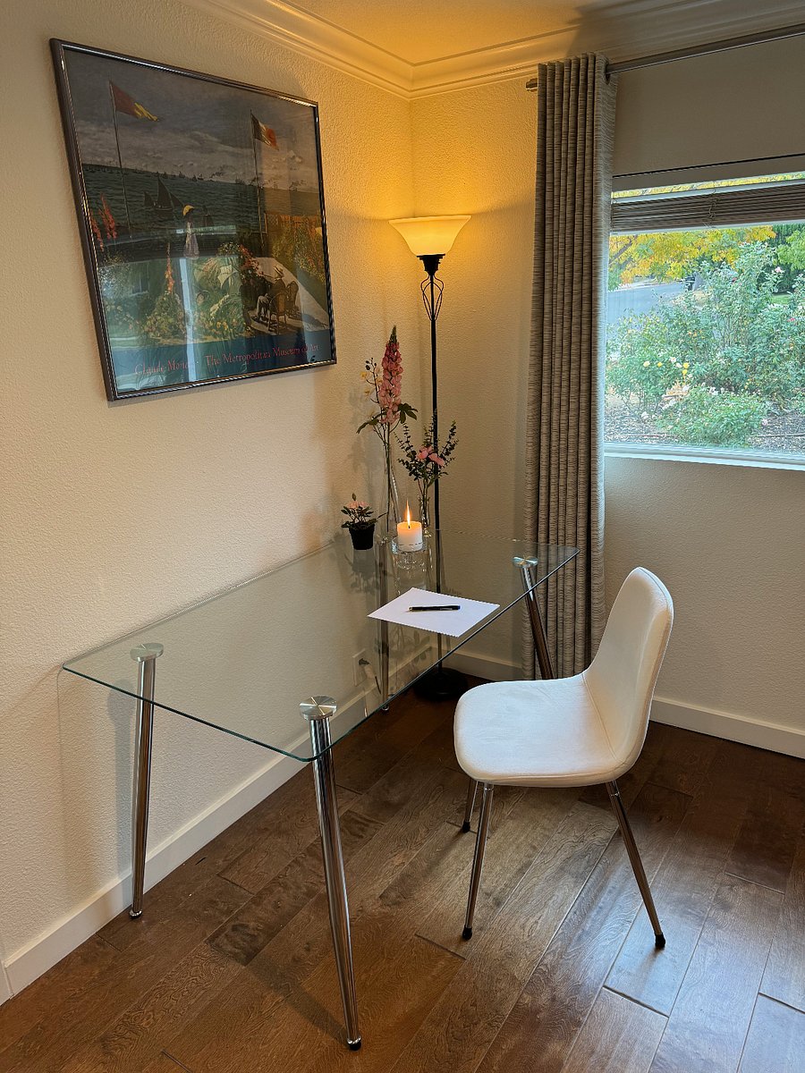 Writing desk in the family room area, with a view of the front rose garden.