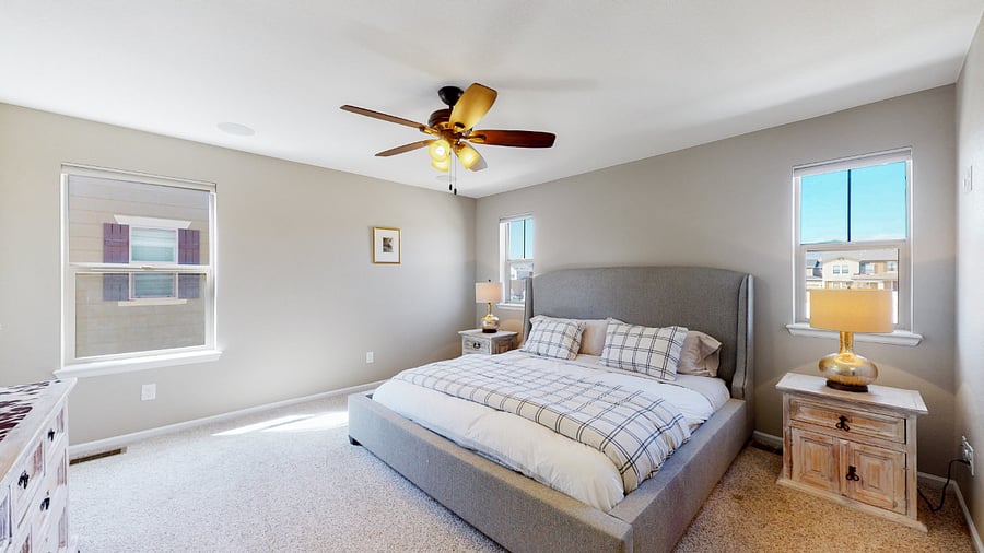 Primary bedroom with large walk in closet and bathroom with two sinks and shower and jetted tub. Tempurpedic mattress.