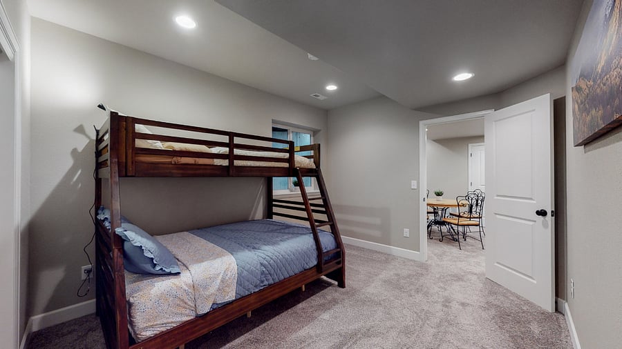 Basement bunkbed with full mattress on the bottomMain