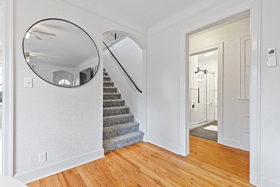 Stairway to bonus room and hallway entrance