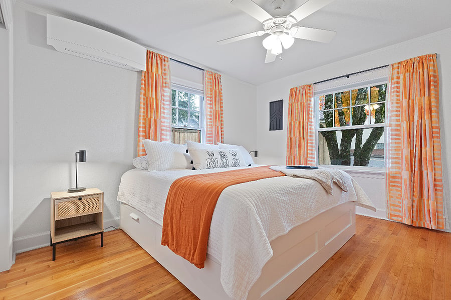 Primary bedroom w/ king size bed