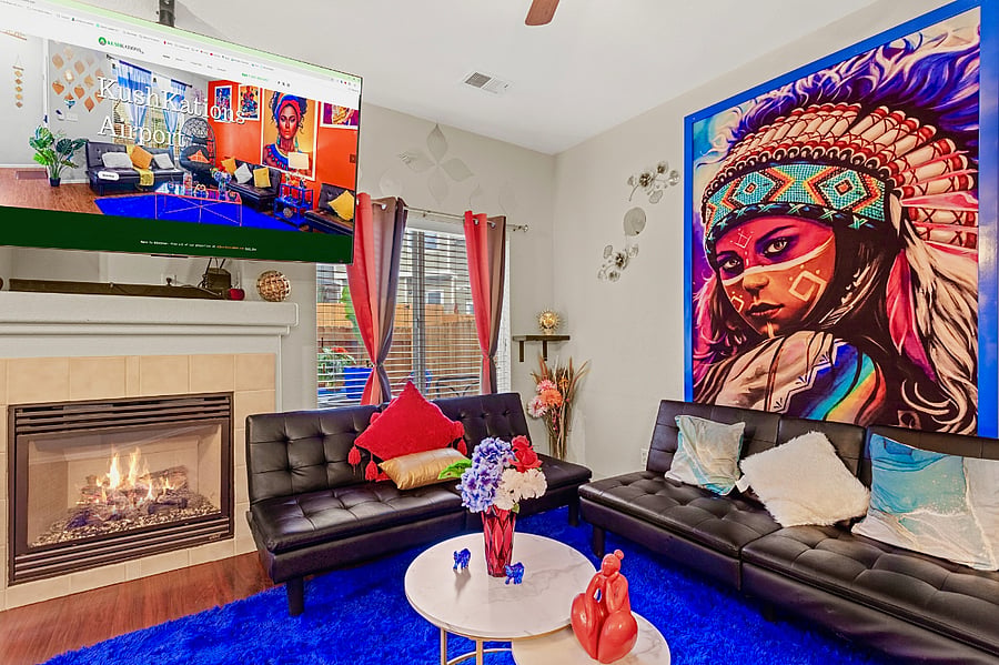 Cozy living room with a fireplace, perfect for relaxing after a day of exploring.