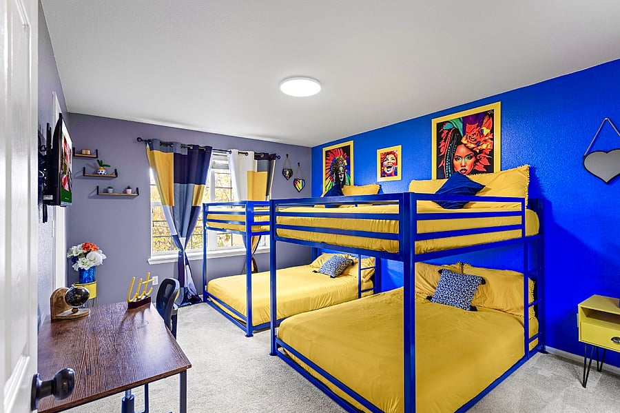 Fun and playful bunk bed room with colorful decor, perfect for kids and sleepovers.