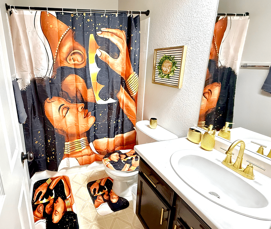 This second-floor full bathroom boasts a clean & modern white interior, creating a bright atmosphere. It features a spacious bathtub, an overhead shower, a sleek sink, and a toilet, along with a functional cabinet for storage.