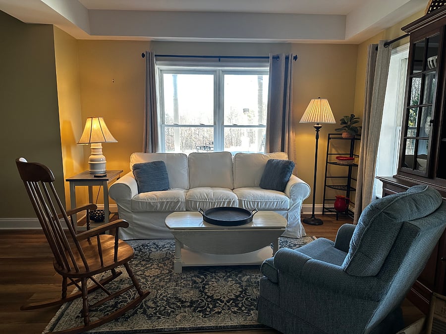 Kitchen living area with comfortable couch to watch the kitchen TV.