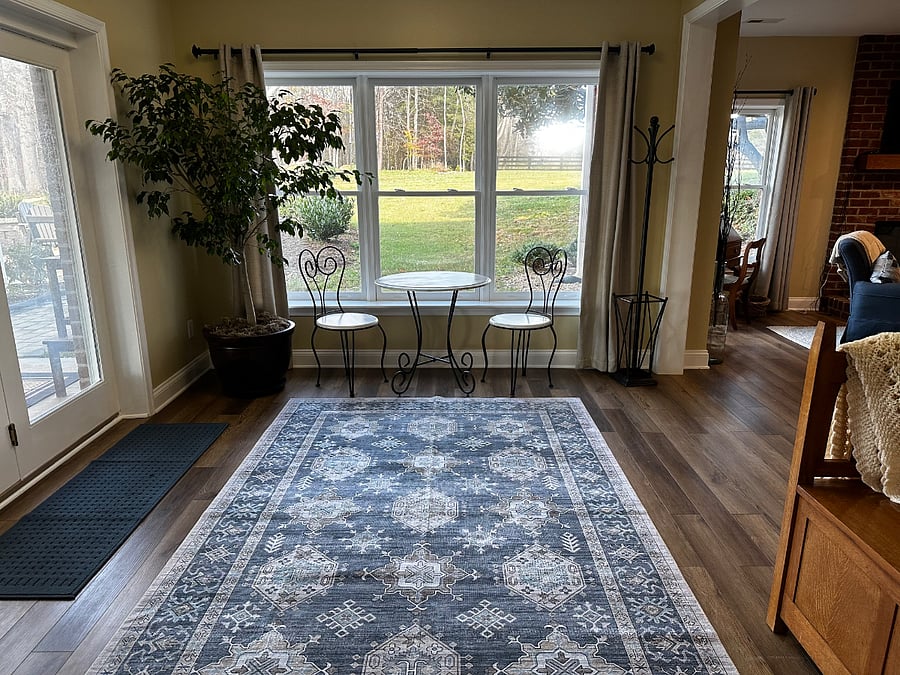 Large entrance with parlor table.