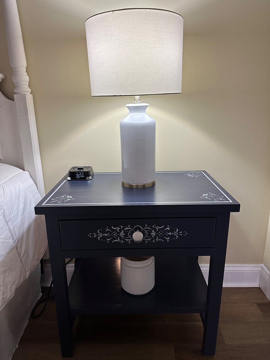Hand stenciled master bedroom side tables.