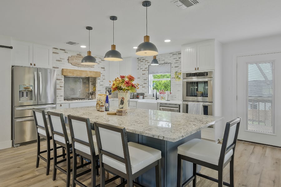 Island seating for 5 plus dining table for 6 next to it