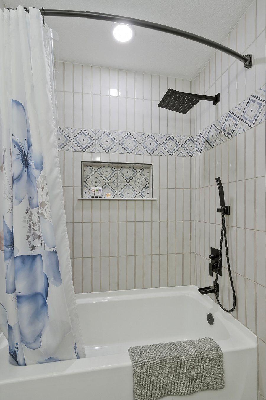 2nd guest bathroom with tub and shower