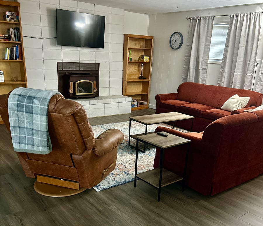 Cozy living room with board game, puzzles and books to enjoy