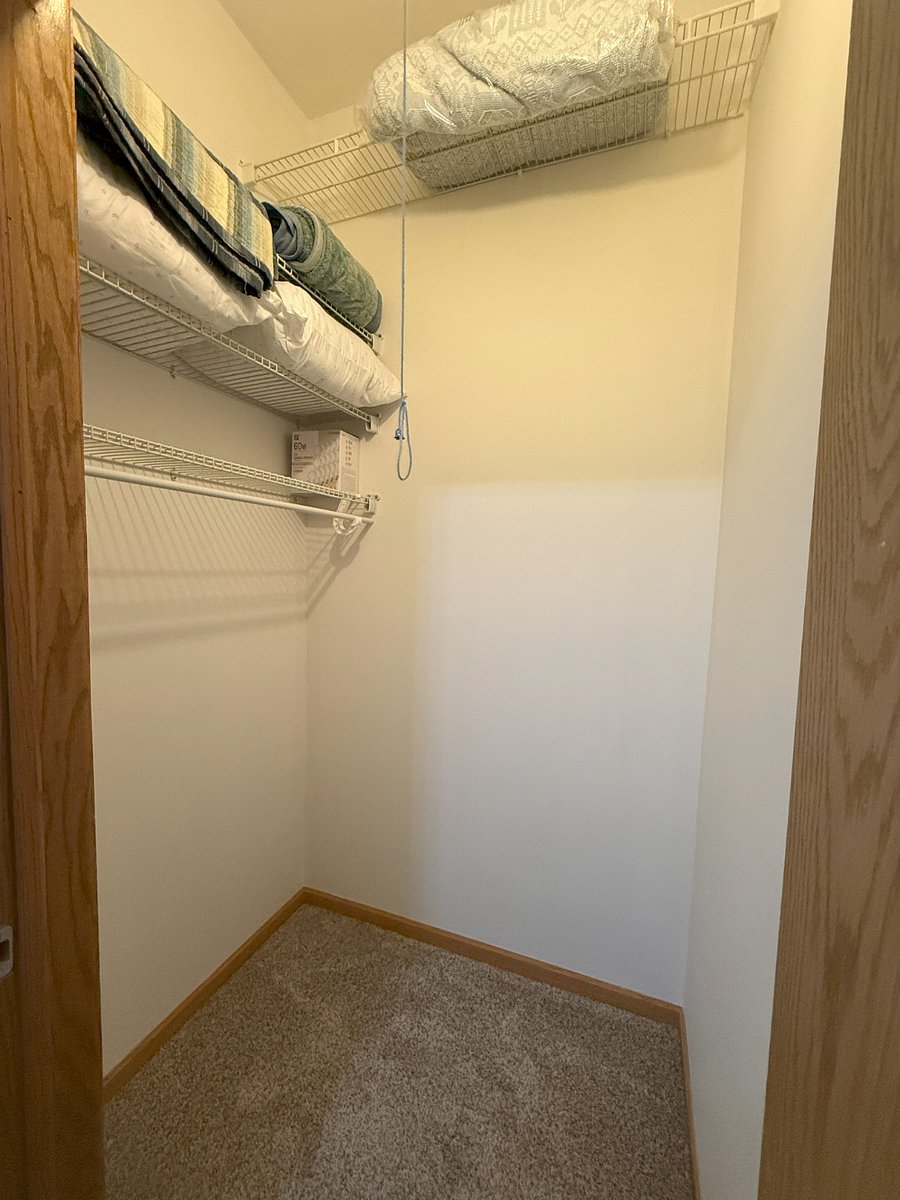 First room closet (blue room) has extra pillows, blankets, etc.