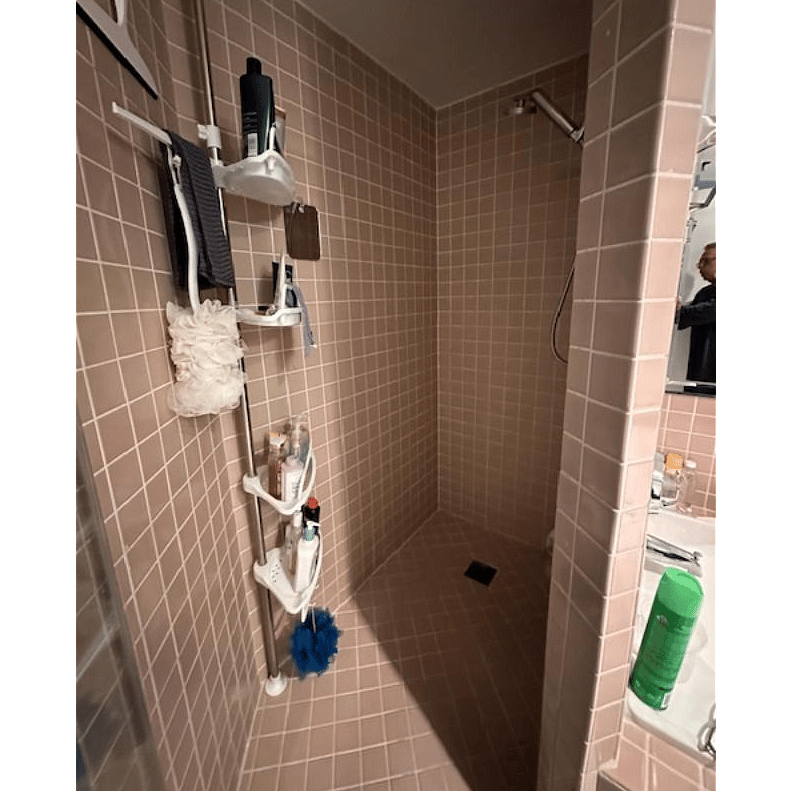 Shared shower in private area of unit