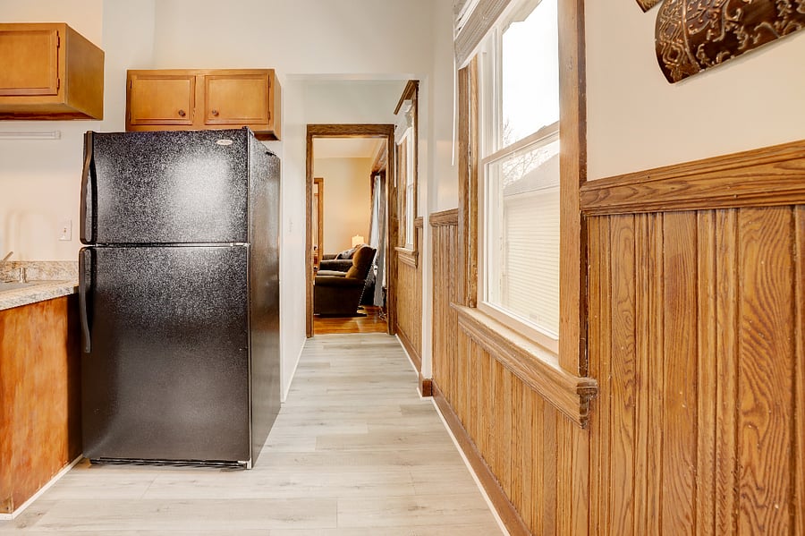 Kitchen going into living room view.