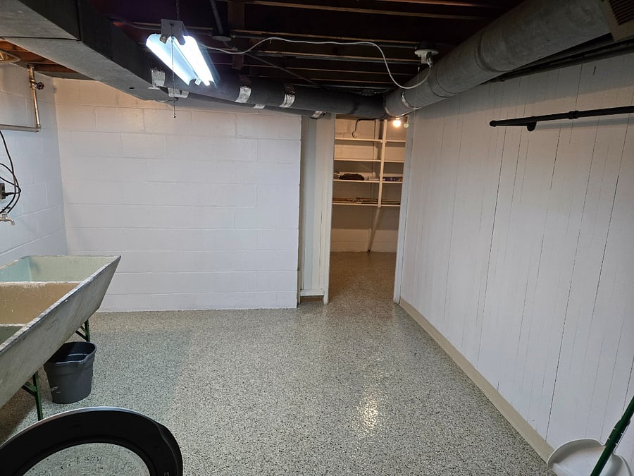 Larger Storage room beyond the laundry room for suitcases.