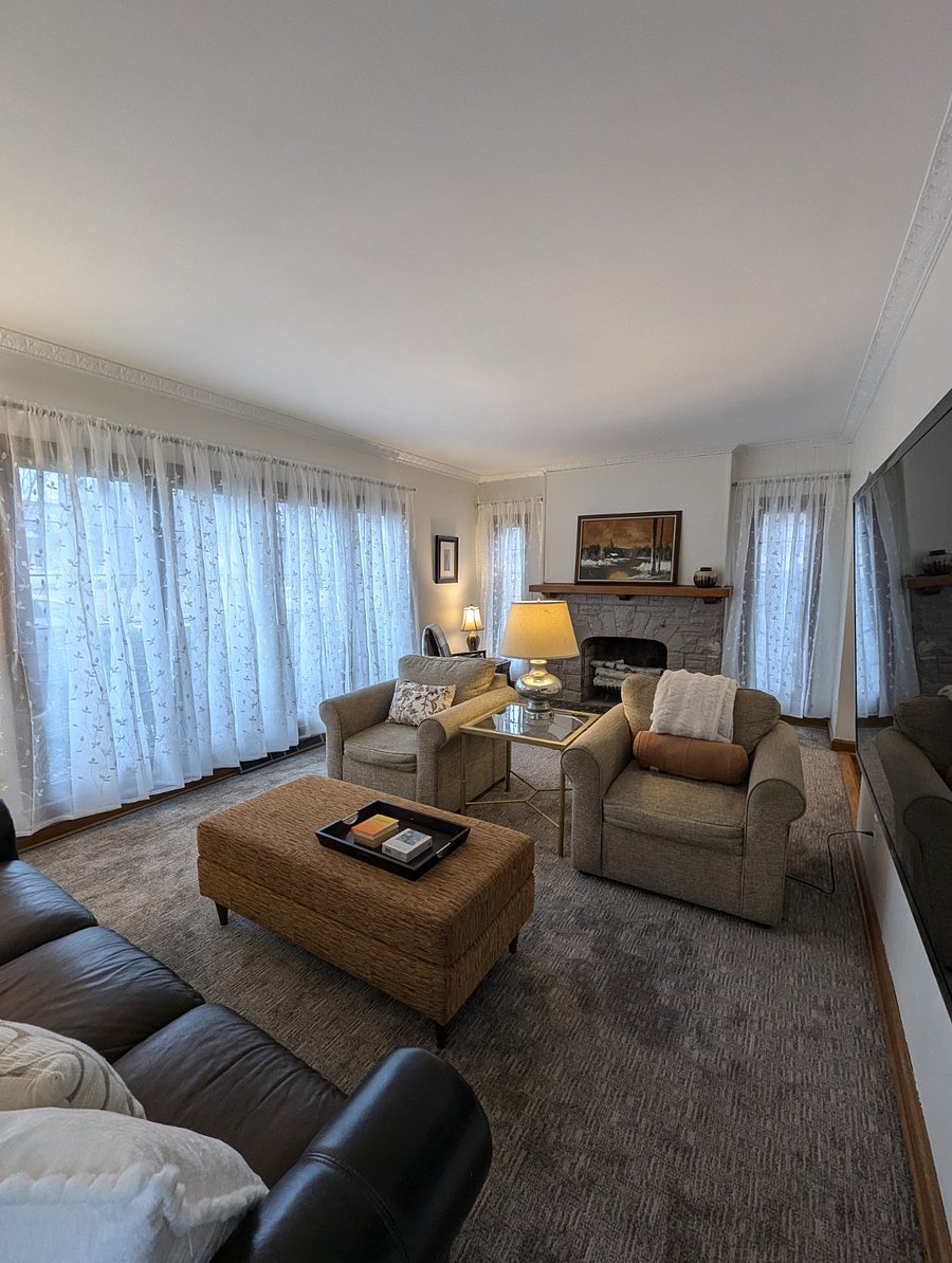 So many windows fill the living room with light.