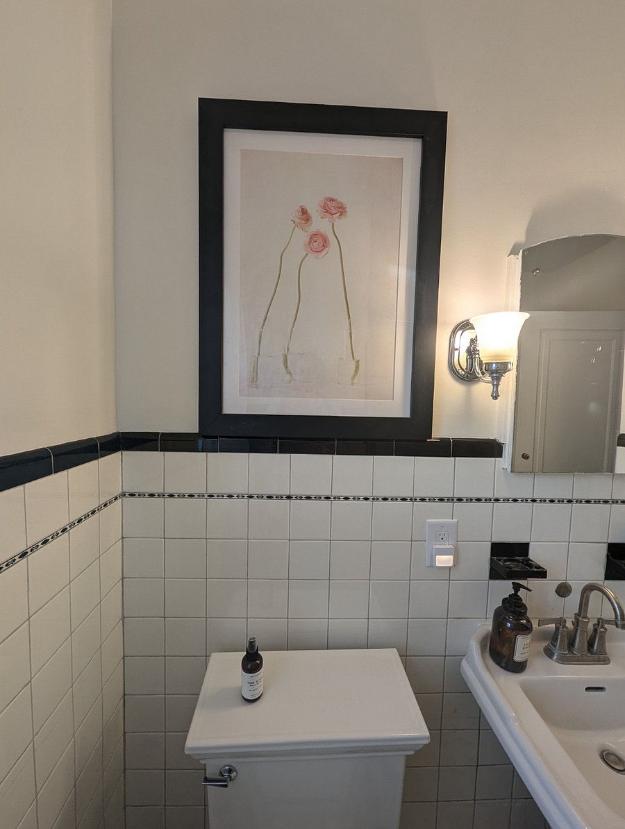 Just one of many original art pieces throughout that truly make it a home away from home.