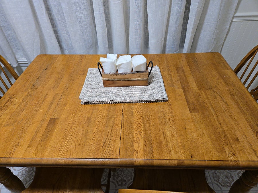 Another table in the sun room offers lots of opportunities for roommates to spread out.