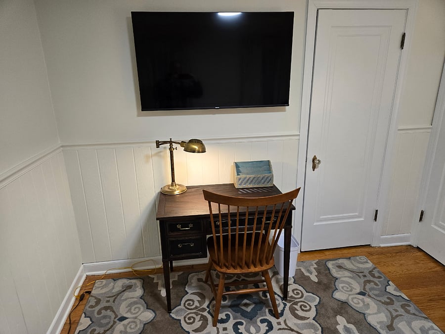 Everything you need right in your room - desk and TV, or watch with friends on the larger living room screen.