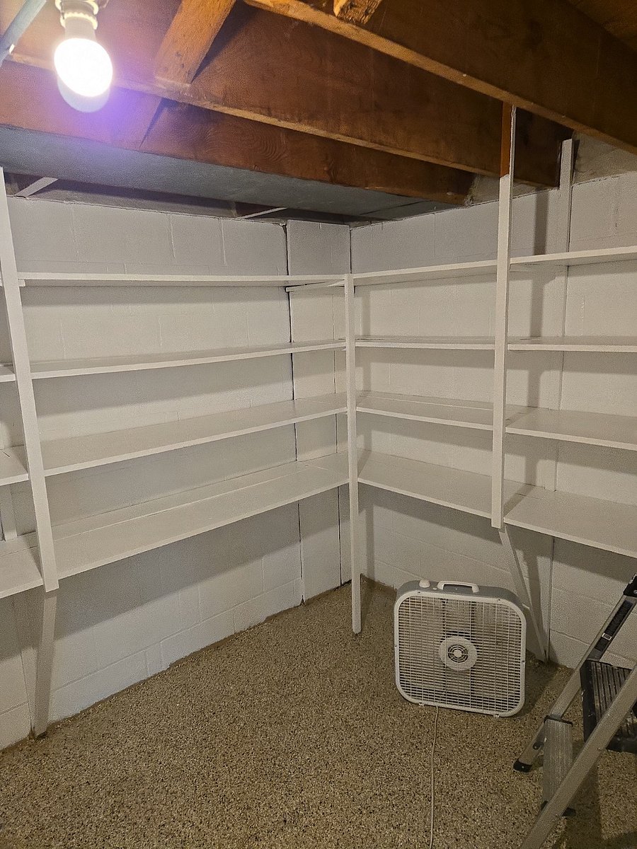 This is a bonus storage room right off the laundry room. Store your suit cases or sporting equipment in here so your room doesn't feel crowded.
