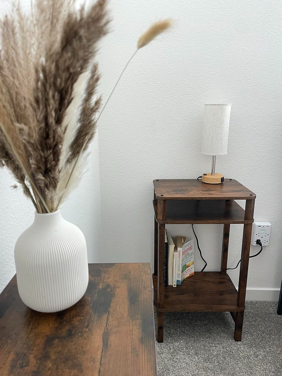 Sleep well with our 3 way dimmable touch lamp with a USB charging port for your convenience.  Books are included for your stay.  