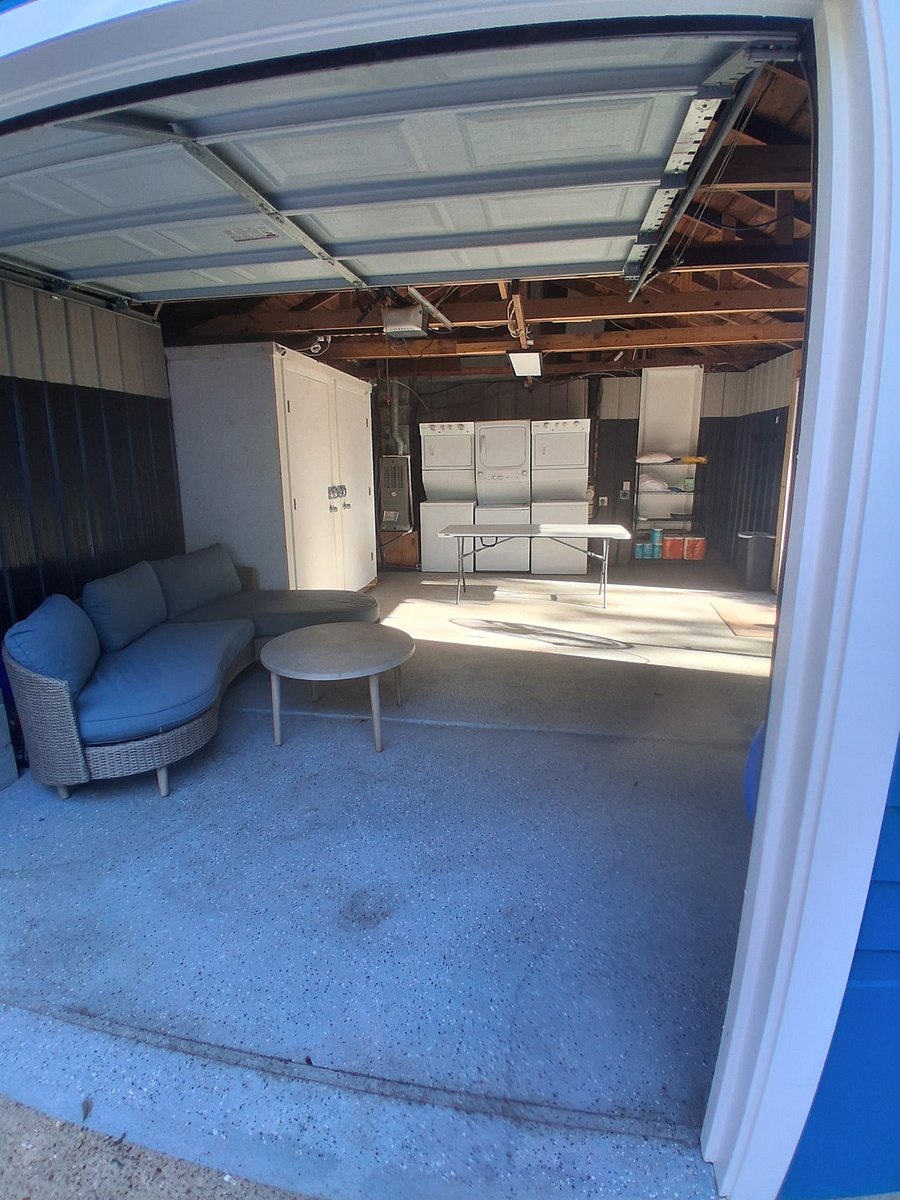 Couch, chairs and a folding table - somewhere to sit, not just wash