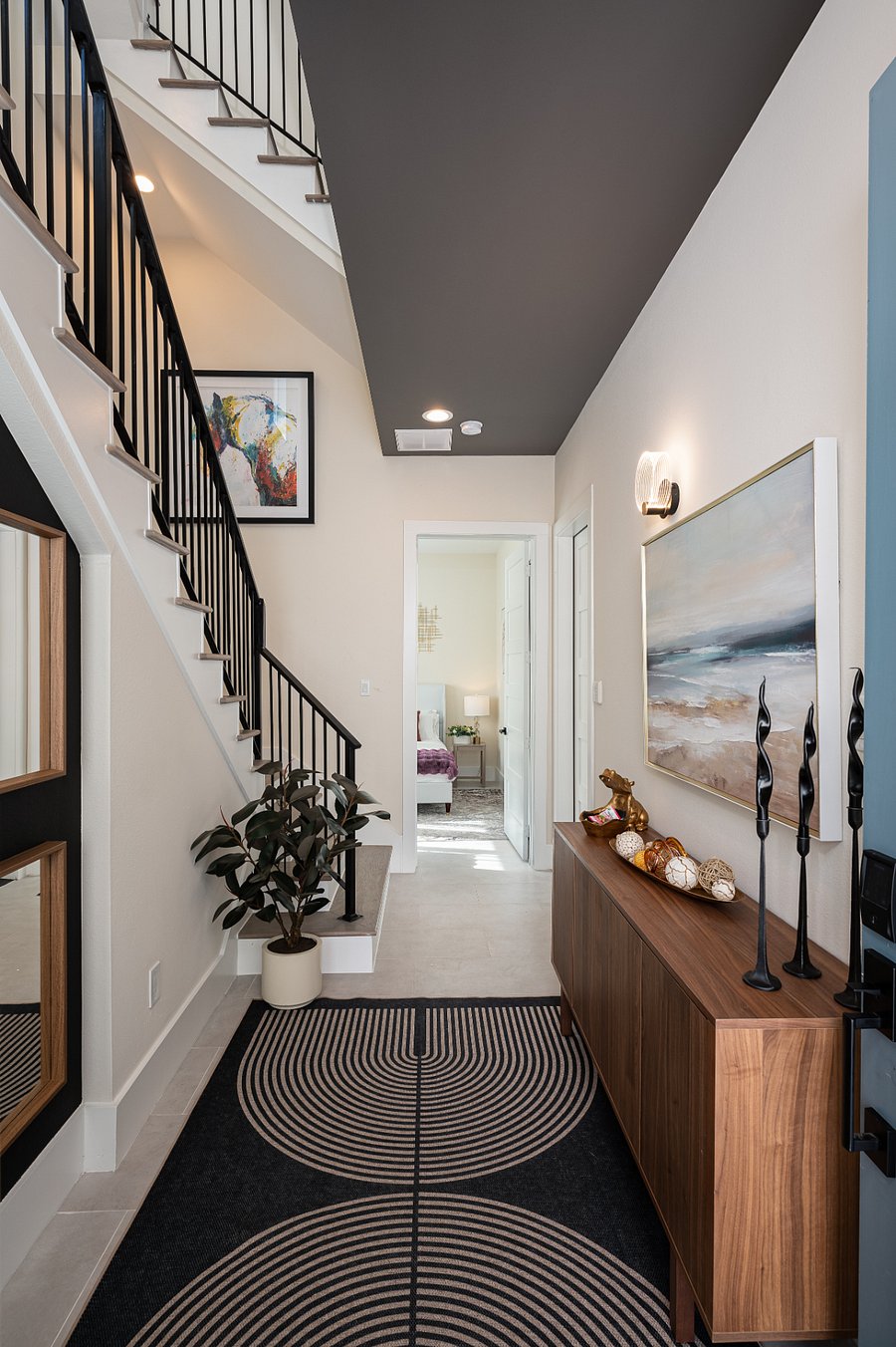 Welcoming Entryway with a Modern Design and Accent Tile