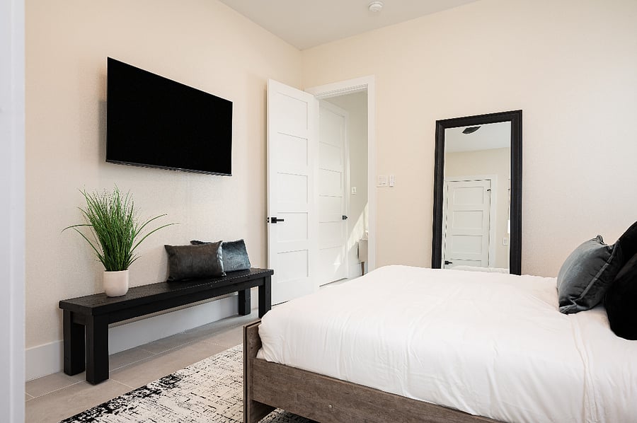 This queen bedroom is the perfect place to relax and unwind after a long day.